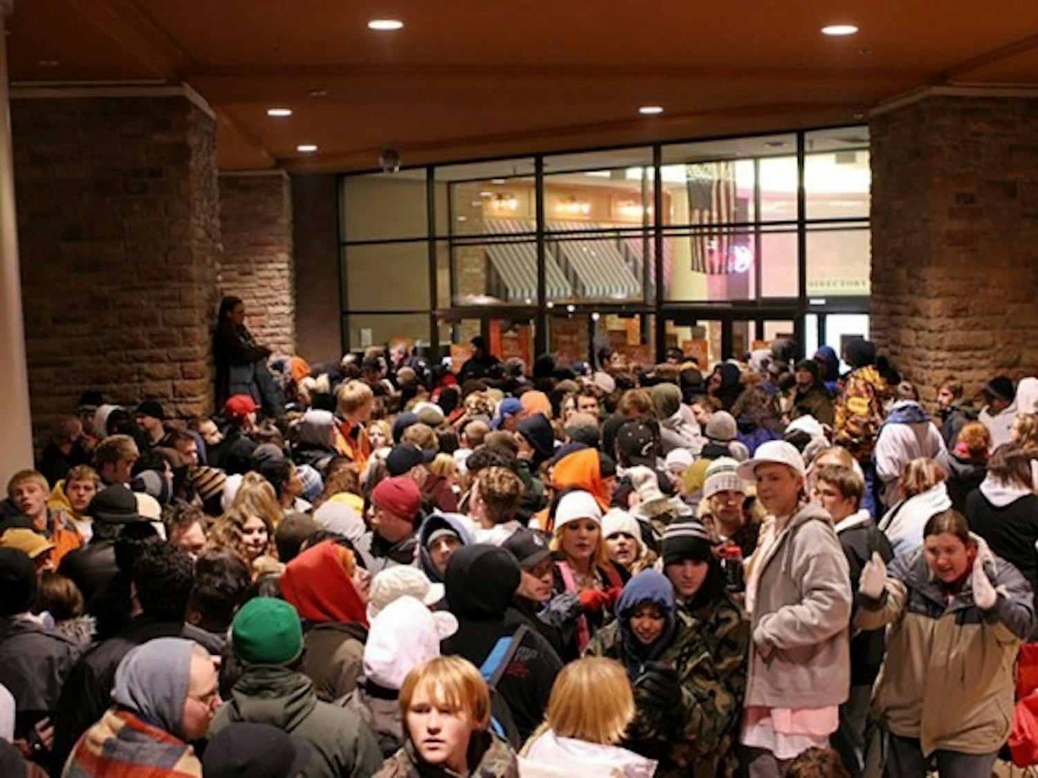 Shoppers on Black Friday wait eagerly to get into their stores of choice.&nbsp;The Walden Galleria Mall in the Buffalo-area is one of many across the nation to begin its Black Friday hours on the day of Thanksgiving.&nbsp;Courtesy of Robert Barney