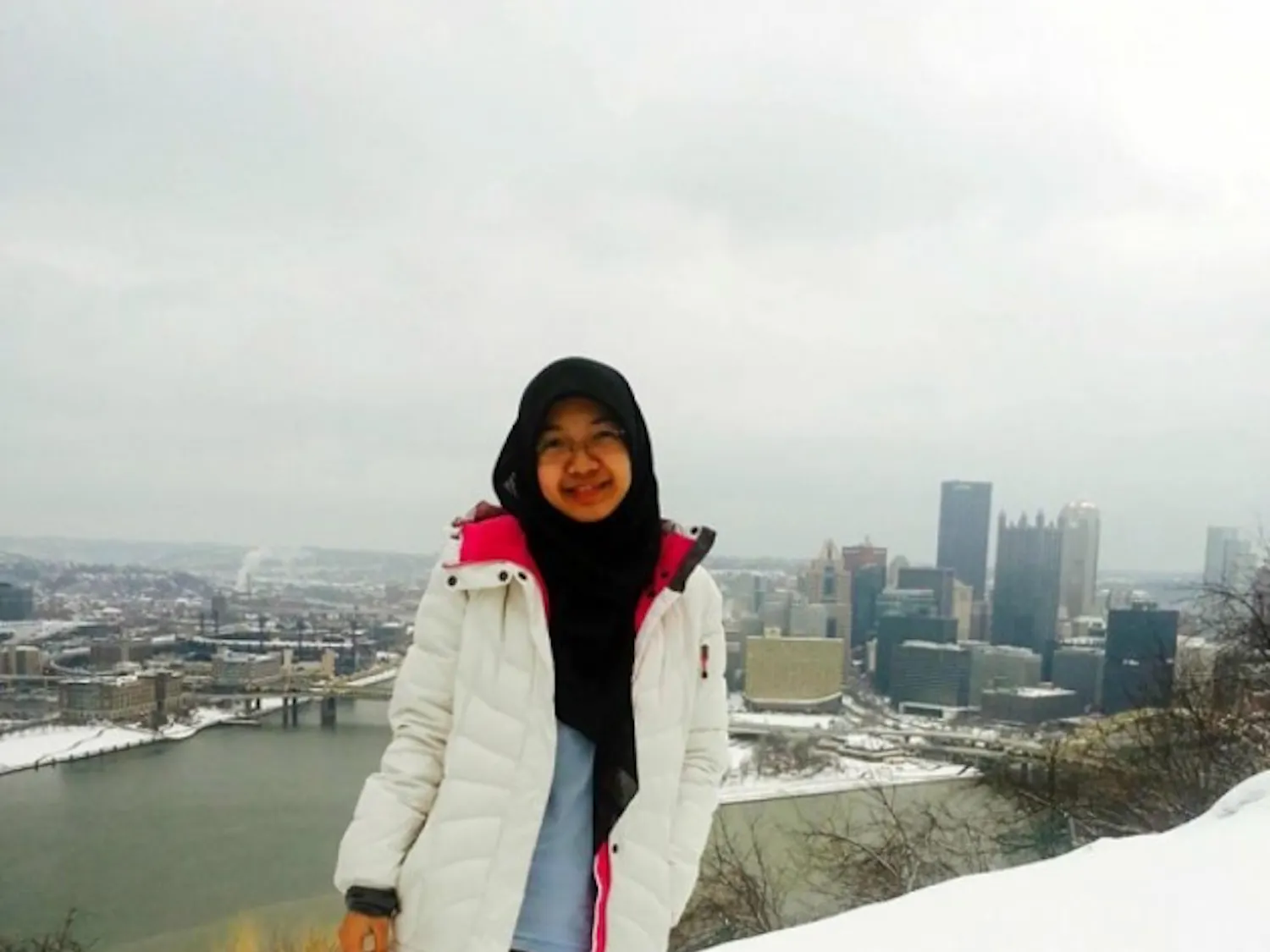 Farhana Shafi's first winter in Buffalo ended
too early, when the senior biotechnology and
communication major from Malaysia
didn't get the chance to build the perfect snowman.
Courtesy of Nur Rosdi