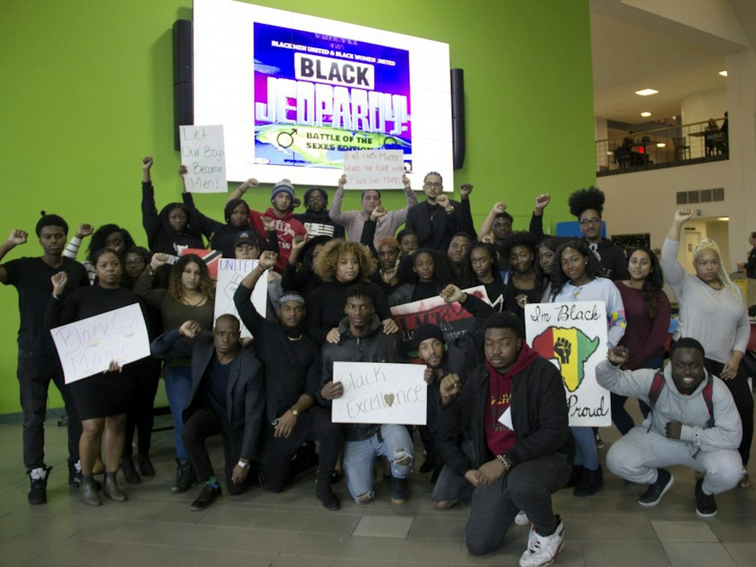 Roughly 30 students participated in a “Black Solidarity” rally as part of Black Solidarity Week on Monday afternoon. Students marched from the Student Union Lobby through the Academic Spine and chanted “Say it loud, I’m black and I’m proud” and “This is what democracy looks like."