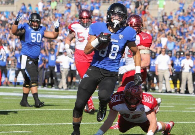 Freshman wide receiver Jacob Martinez scored his first career touchdown on a 9-yard pass from junior quarterback Joe Licata in the Bulls&rsquo; 35-27 victory Saturday. Chad Cooper, The Spectrum