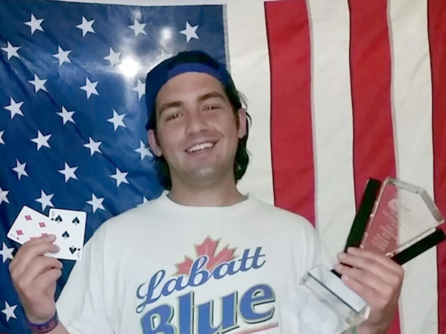 Kevin Mathias holds his first place trophy from event number one of the Western New York Poker Challenge. Mathias says he has won about $25,000 in earnings from poker. Courtesy of Kevin Mathias