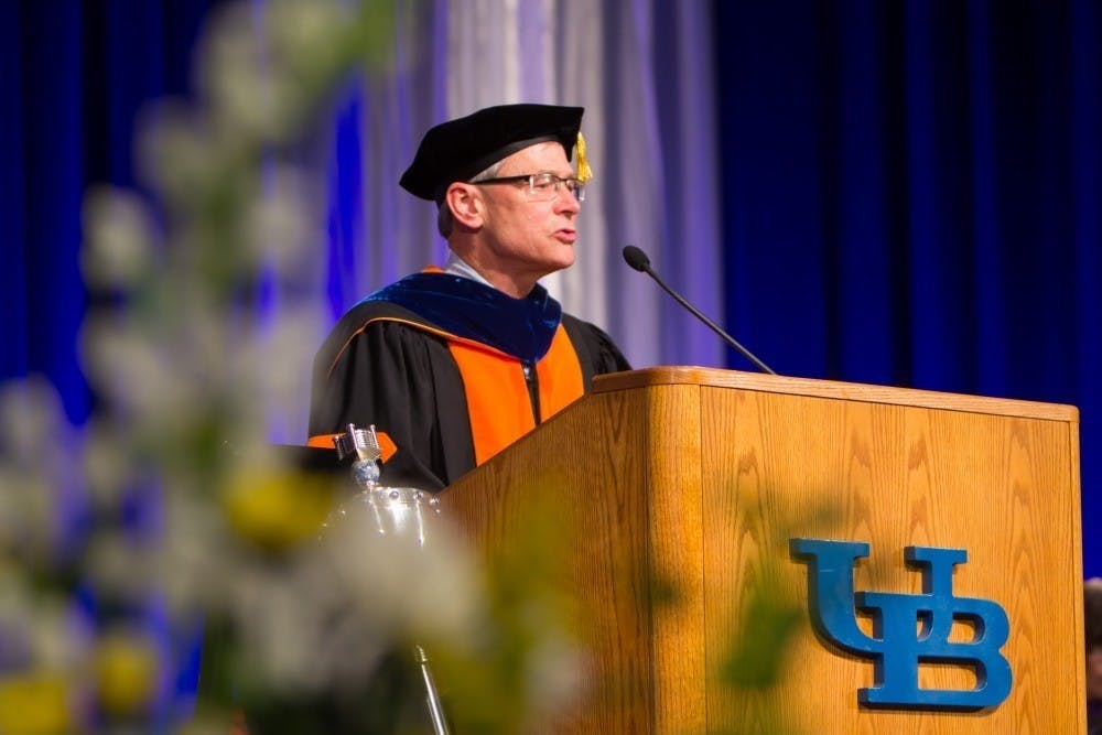 Former UB provost Charles Zukoski speaks to graduates at the university's 2018 commencement ceremony.