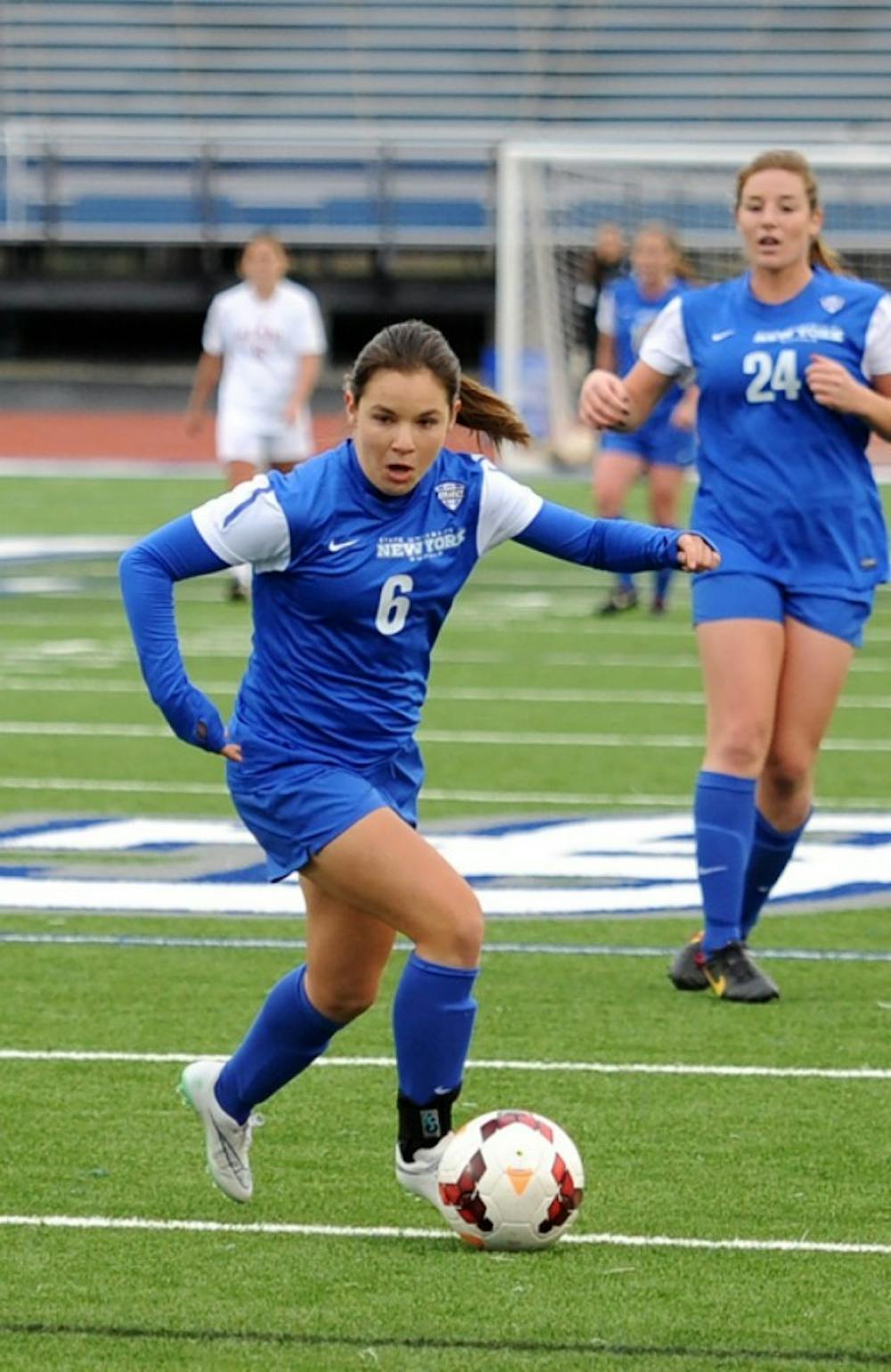 <p>Sophomore midfielder Julia Benati (6) pushes the ball down field in a game last season. She had the first goal of the Bulls' 3-0 win over Binghamton Friday. </p>