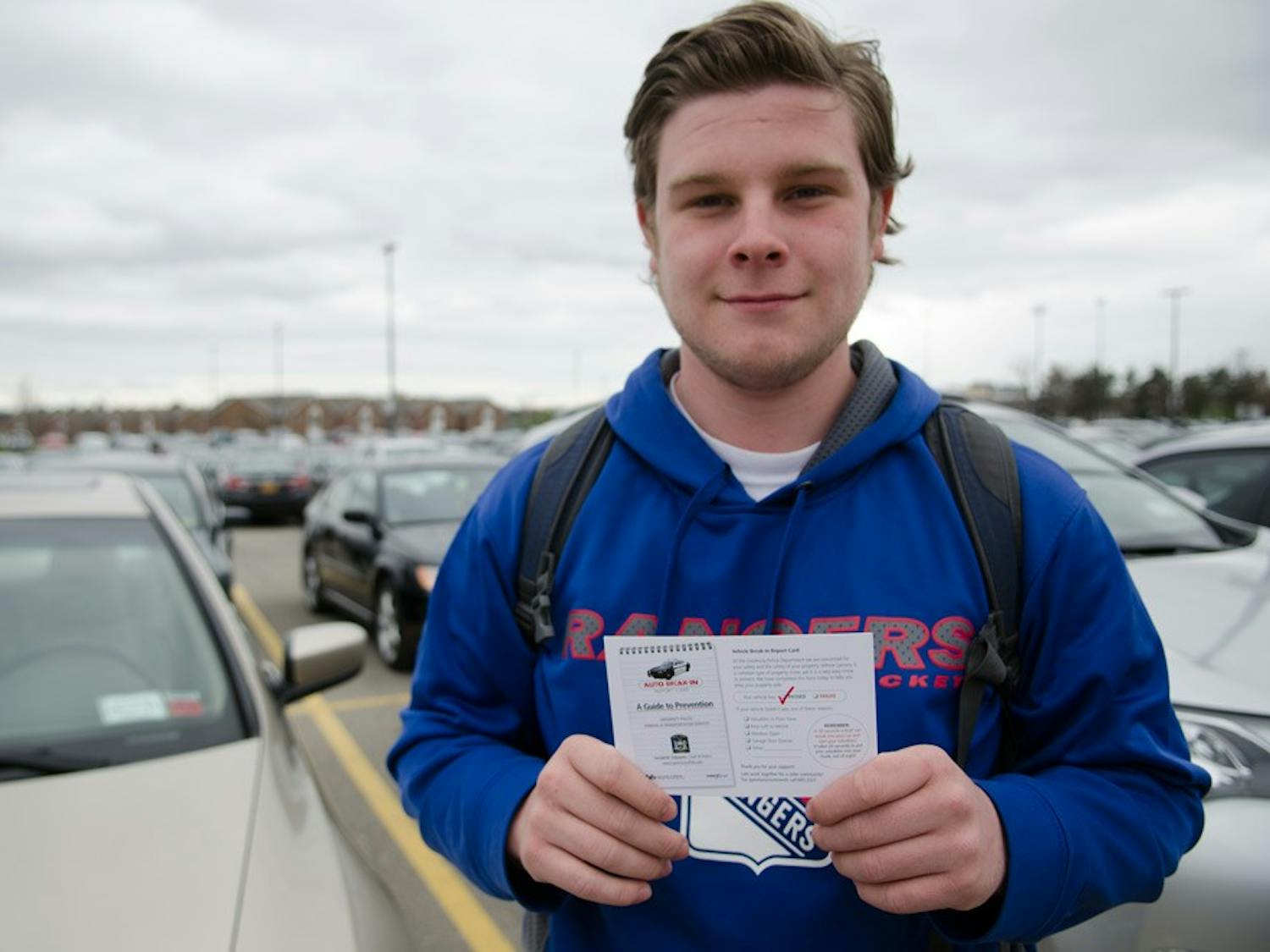 Nicholas Gross, a sophomore environmental design major, a received a passing grade on the ‘Vehicle Break-in Report Card’ placed on his car. UPD checks vehicles on campus to make sure they’re not susceptible to break-ins or theft and leaves 'Vehicle Break-In Report Cards’ indicating to students whether their cars are susceptible to break-in.