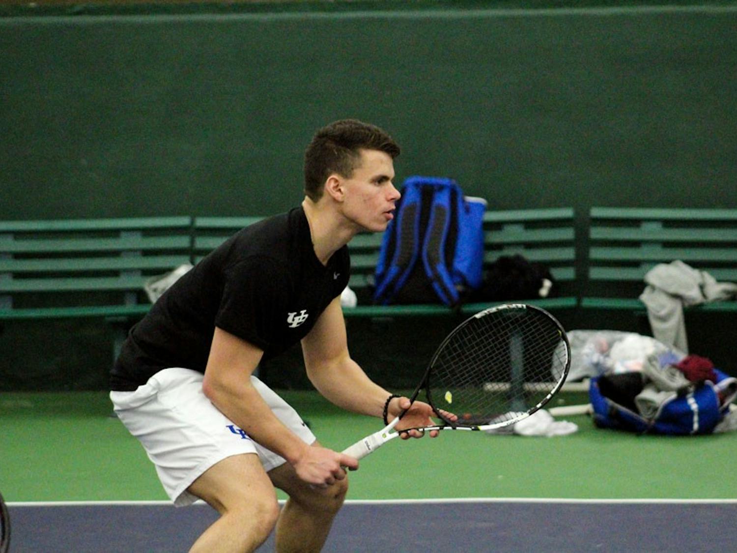 Freshman Konstantinos Tsakiris gets ready for an incoming tennis ball. The men’s tennis team has been having a solid season this year.