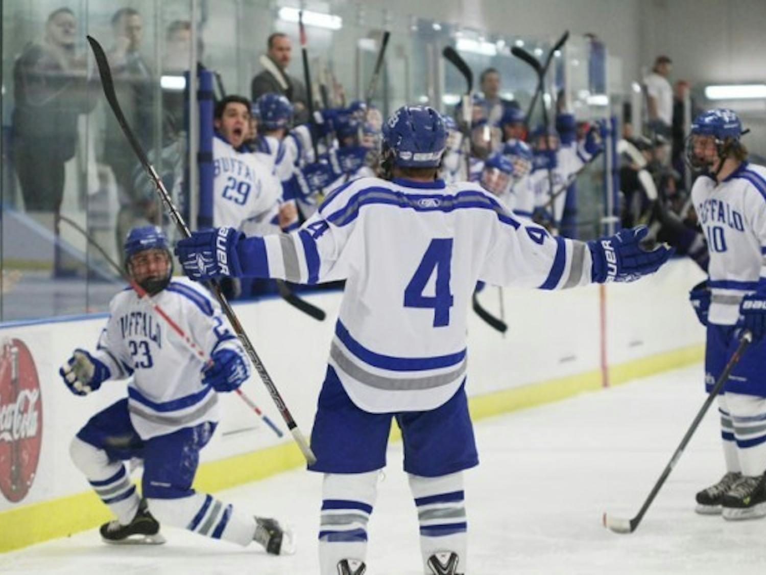Seniors Michael Schalberg, Chris Marsack and Bryan Bergstol celebrate a goal in Buffalo’s playoff loss to Niagara last year. No. 14 Buffalo is 10-2 this season despite a slew of injuries and faces No. 23 Niagara Friday. Chad Cooper, The Spectrum