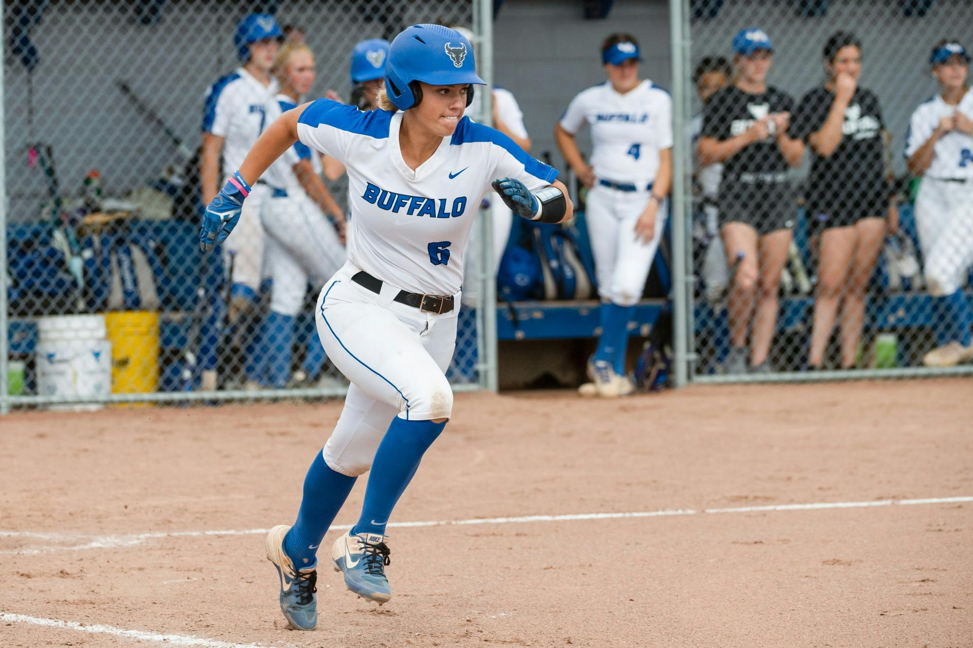 Senior catcher Olivia Kincanon runs to first base during a game last season.
