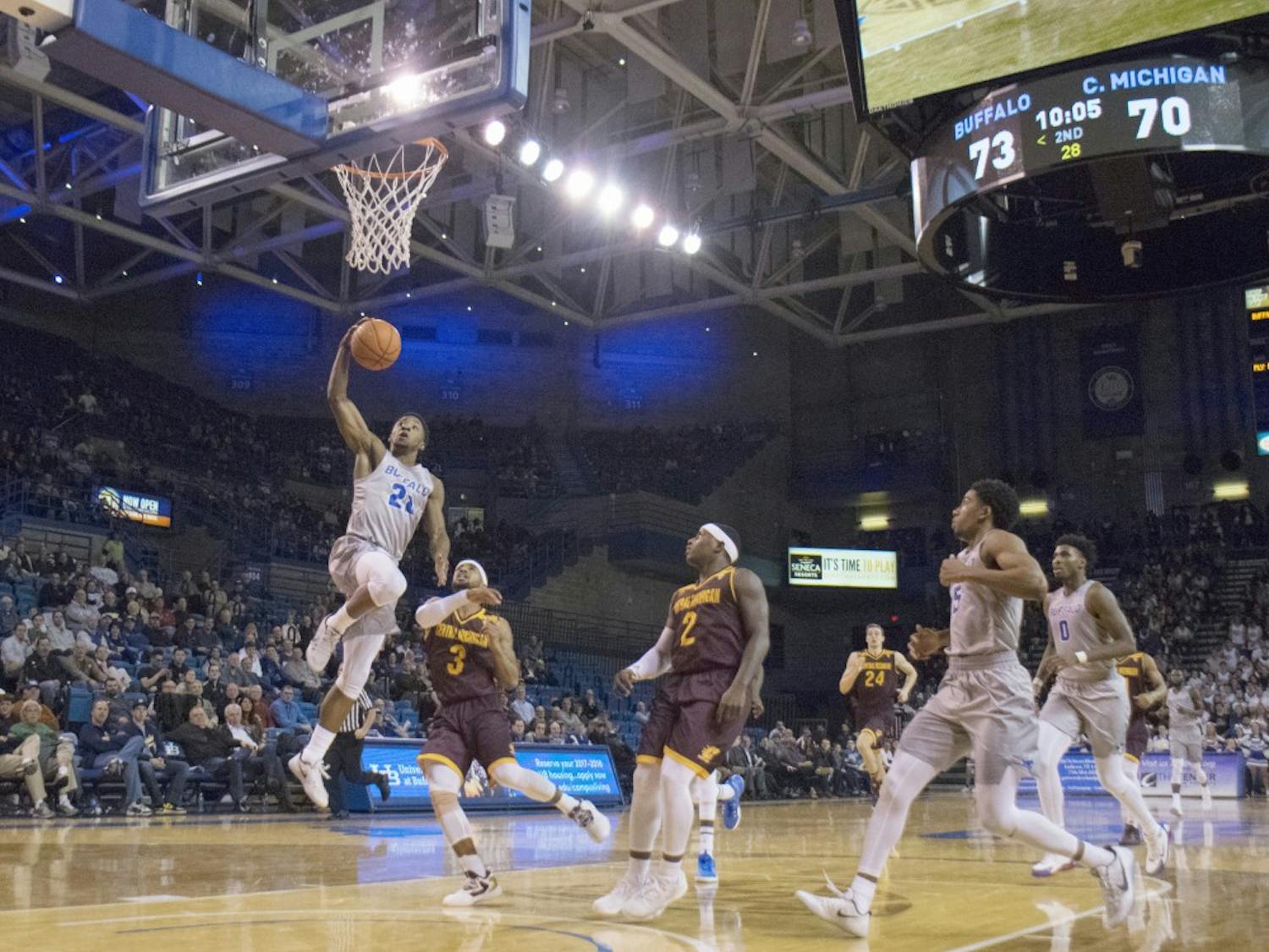 Sophomore guard Dontay Caruthers dunks against Central Michigan. Caruthers was named the MAC Defensive Player of the Year.