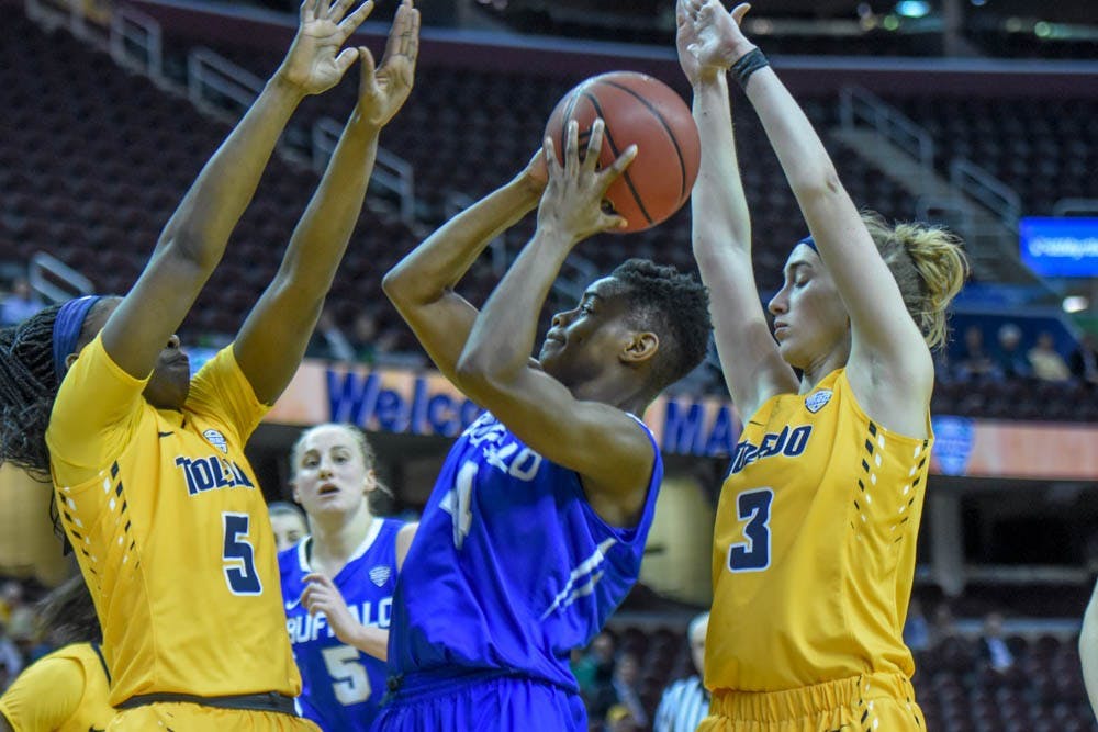 <p>Toledo players guard&nbsp;senior guard Joanna Smith during Friday's game. The Bulls' loss to Toledo eliminates them from the MAC tournament.&nbsp;</p>