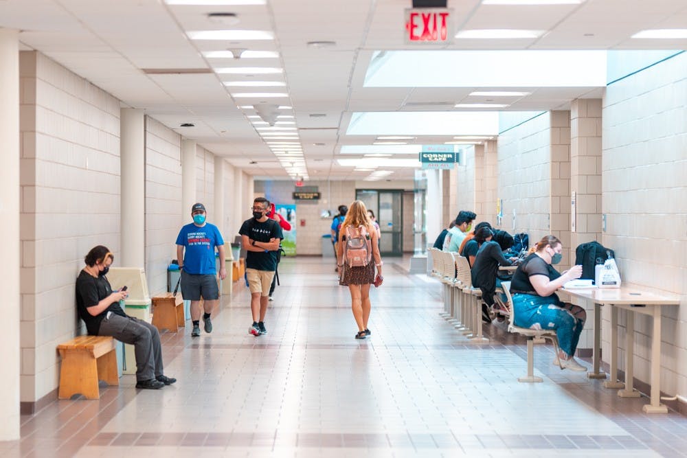 Students, faculty and staff will still be required to wear masks indoors.