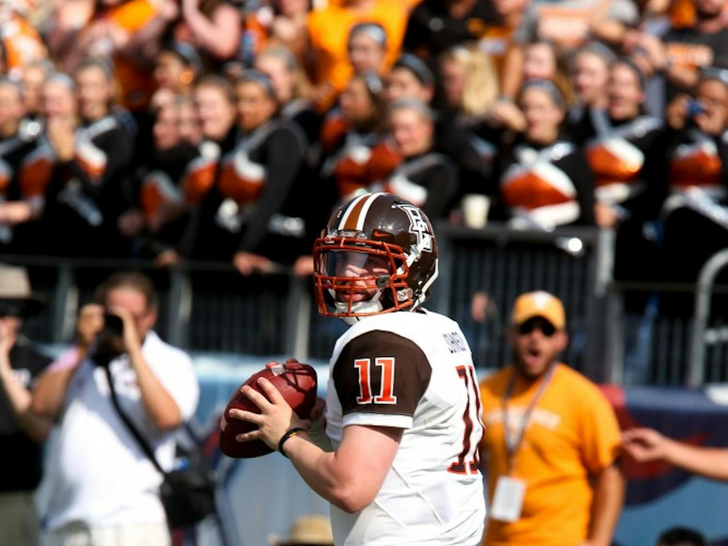 Senior quarterback Matt Johnson looks to complete the pass. Johnson leads the nation in passing yards with 1760.