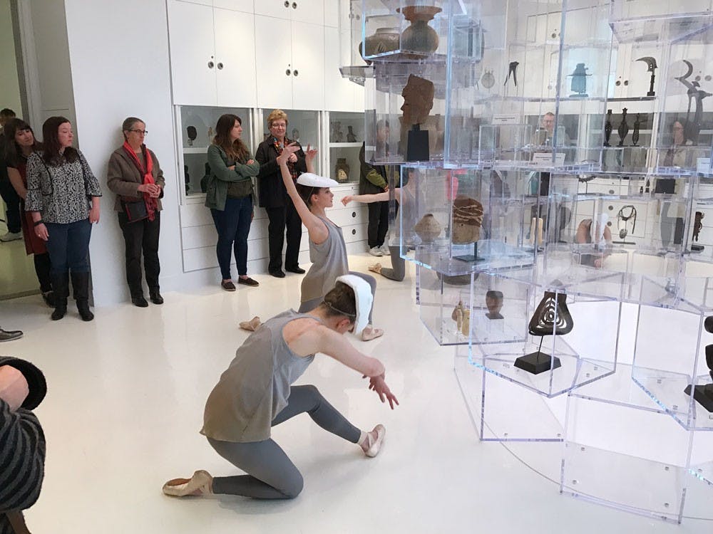 <p>Senior dance major Maggie Hansen (left) and junior dance major Mary Pappagallo (right) perform during the opening night of&nbsp;"The Language of Objects" exhibition at UB's Anderson Gallery.&nbsp;</p>