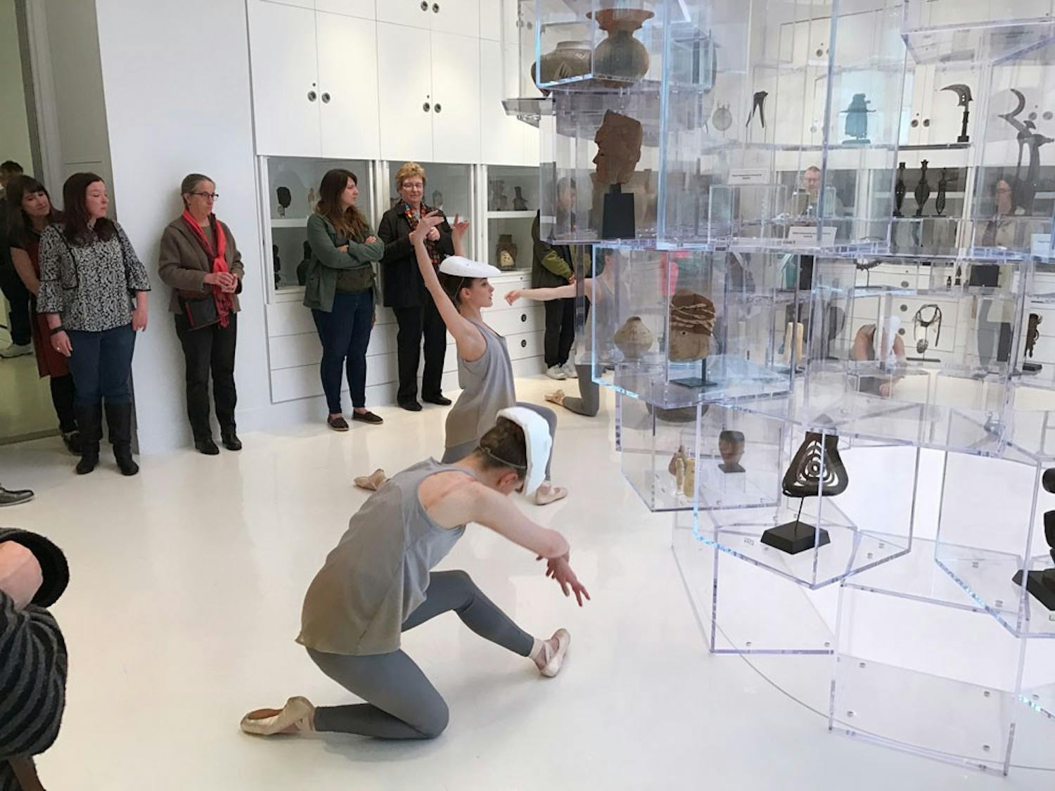 Senior dance major Maggie Hansen (left) and junior dance major Mary Pappagallo (right) perform during the opening night of "The Language of Objects" exhibition at UB's Anderson Gallery. 