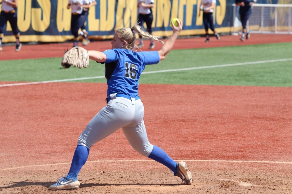 <p>Senior pitcher Ally Power winds up to throw. Power went five innings, surrendering two runs and striking out four as the Bulls lost game one of their doubleheader.</p>