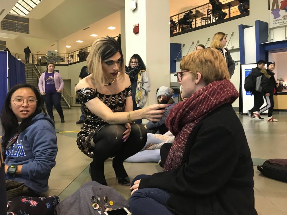 <p>Drag queen Alice Raige answered questions from the community during the Q&amp;A portion of the drag show on Friday.&nbsp;</p>
