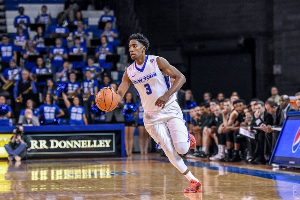 <p>Freshman guard CJ Massinburg drives up the floor, looking to make a play. The freshman guard from Dallas, Texas has made a splash as a backup guard this season for the Bulls.</p>