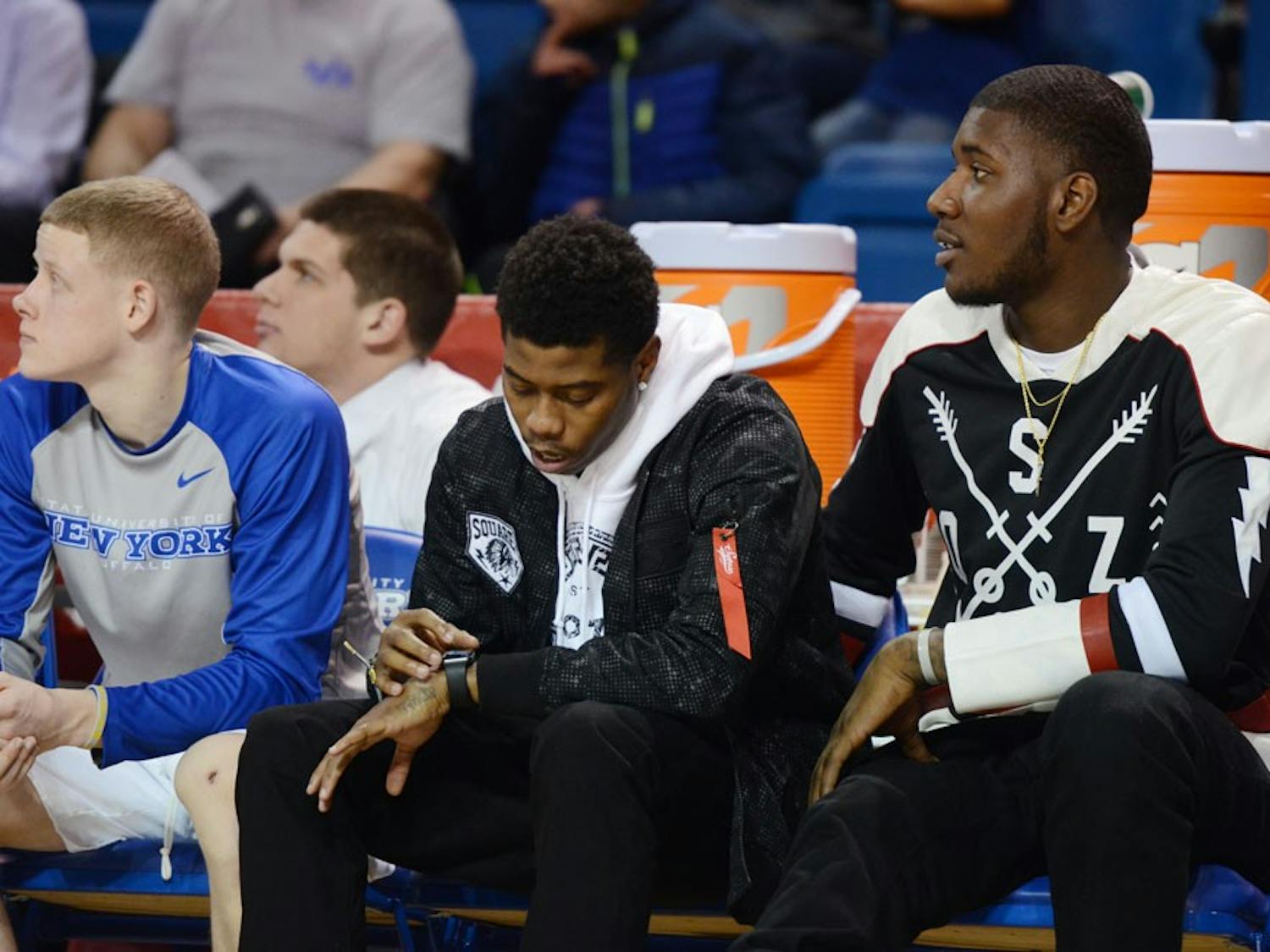 Sophomore guard Lamonte Bearden checks his watch on the bench during Buffalo's 71-69 loss to Toledo Tuesday night. Bearden was suspended indefinitely for "conduct detrimental to the team."