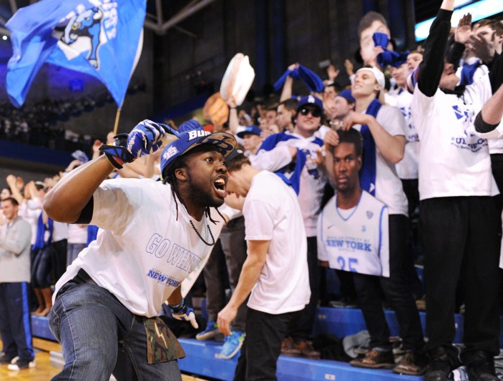 <p>Shane Patterson looks to get the crowd excited during a UB basketball home game. The junior communication major is in the process of trying to walk on to the football team as a wide receiver while spreading his positive energy around campus.</p>
