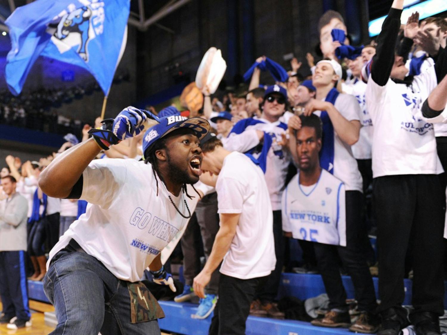 Shane Patterson looks to get the crowd excited during a UB basketball home game. The junior communication major is in the process of trying to walk on to the football team as a wide receiver while spreading his positive energy around campus.