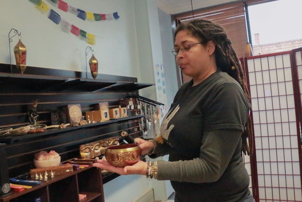 Kurtlyn Cunningham, owner of Love, Light &amp; Magick, shows off some of her store’s goods. Love Light &amp; Magick is one of many spiritual specialty stores scattered around Buffalo, alongside Strange Brew in Kenmore and Spiritually Rooted in North Tonawanda, which form the core of Buffalo’s metaphysical community, often offering tarot readings, psychic development workshops and henna drawings.