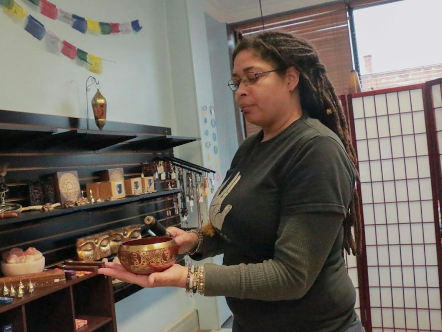 Kurtlyn Cunningham, owner of Love, Light & Magick, shows off some of her store’s goods. Love Light & Magick is one of many spiritual specialty stores scattered around Buffalo, alongside Strange Brew in Kenmore and Spiritually Rooted in North Tonawanda, which form the core of Buffalo’s metaphysical community, often offering tarot readings, psychic development workshops and henna drawings.