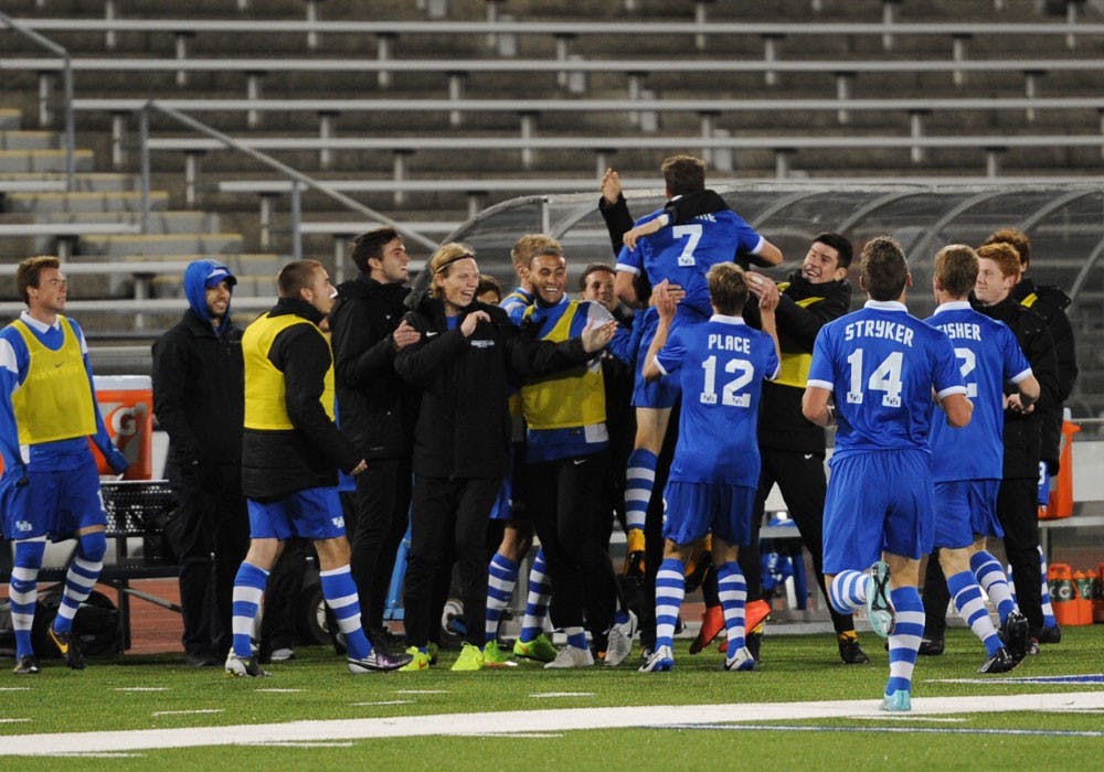 <p>The men’s team celebrates a victory on the field. For Spring break, the Bulls will travel to the United Kingdom to gain experience while submersed in the English soccer culture.</p>