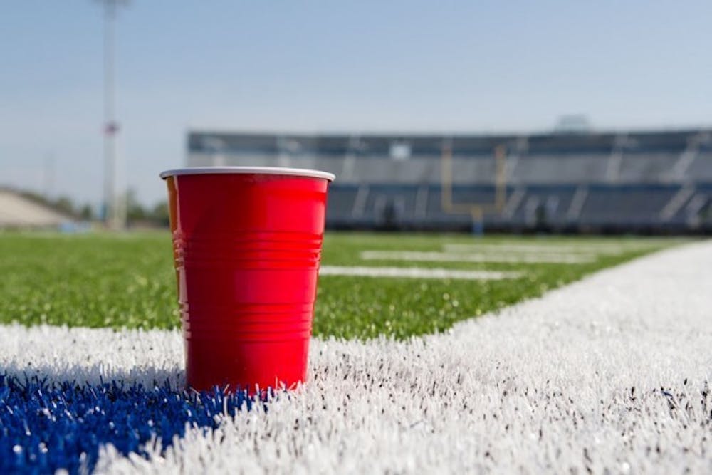 Alcohol is not served inside UB Stadium at the regular concessions. The practice of selling beer inside college football stadium is increasing, however, as 21 schools will serve beer at their football games this season. Photo Illustration.&nbsp;Chad Cooper, The Spectrum