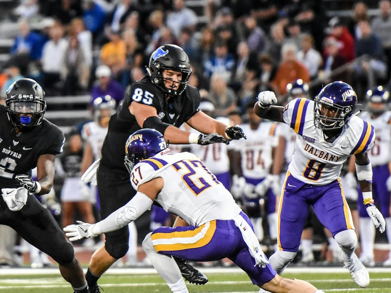 Mason Schreck throws a block against Albany. He has been a bright spot this year for an anemic Buffalo offense.