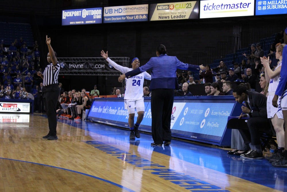 Senior guard Cierra Dillard embraces head coach Felisha Legette-Jack as Dillard walks off the floor of Alumni Arena one final time last Wednesday.