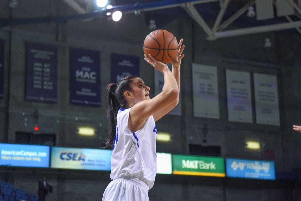 <p>Junior center Cassie Oursler takes a shot.&nbsp;Oursler&nbsp;had a significant impact for the Bulls during Saturday's game while defending inside.</p>