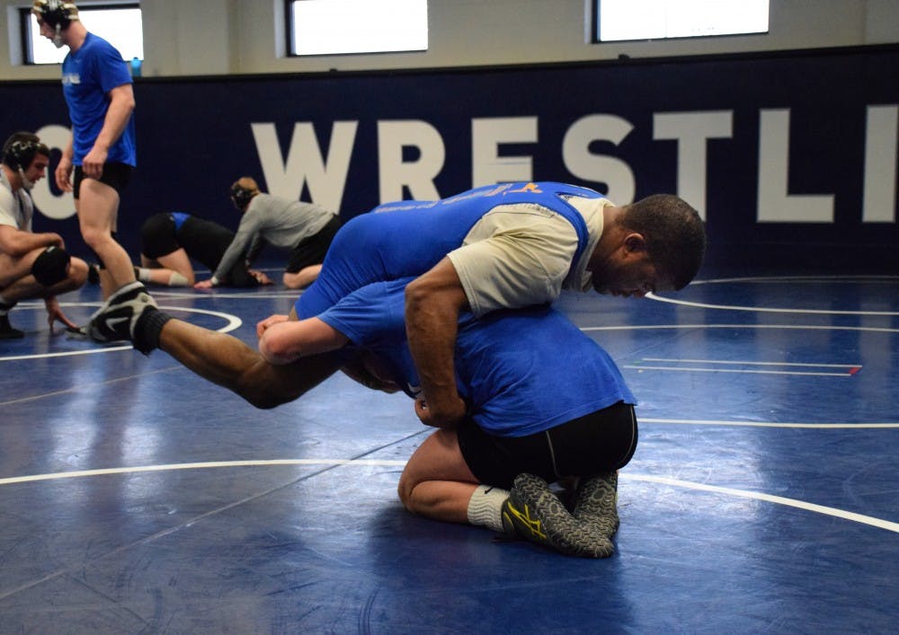 Two UB Wrestlers grapple at a practice. The Bulls will head to Northern Iowa this weekend to compete in MAC Championships.