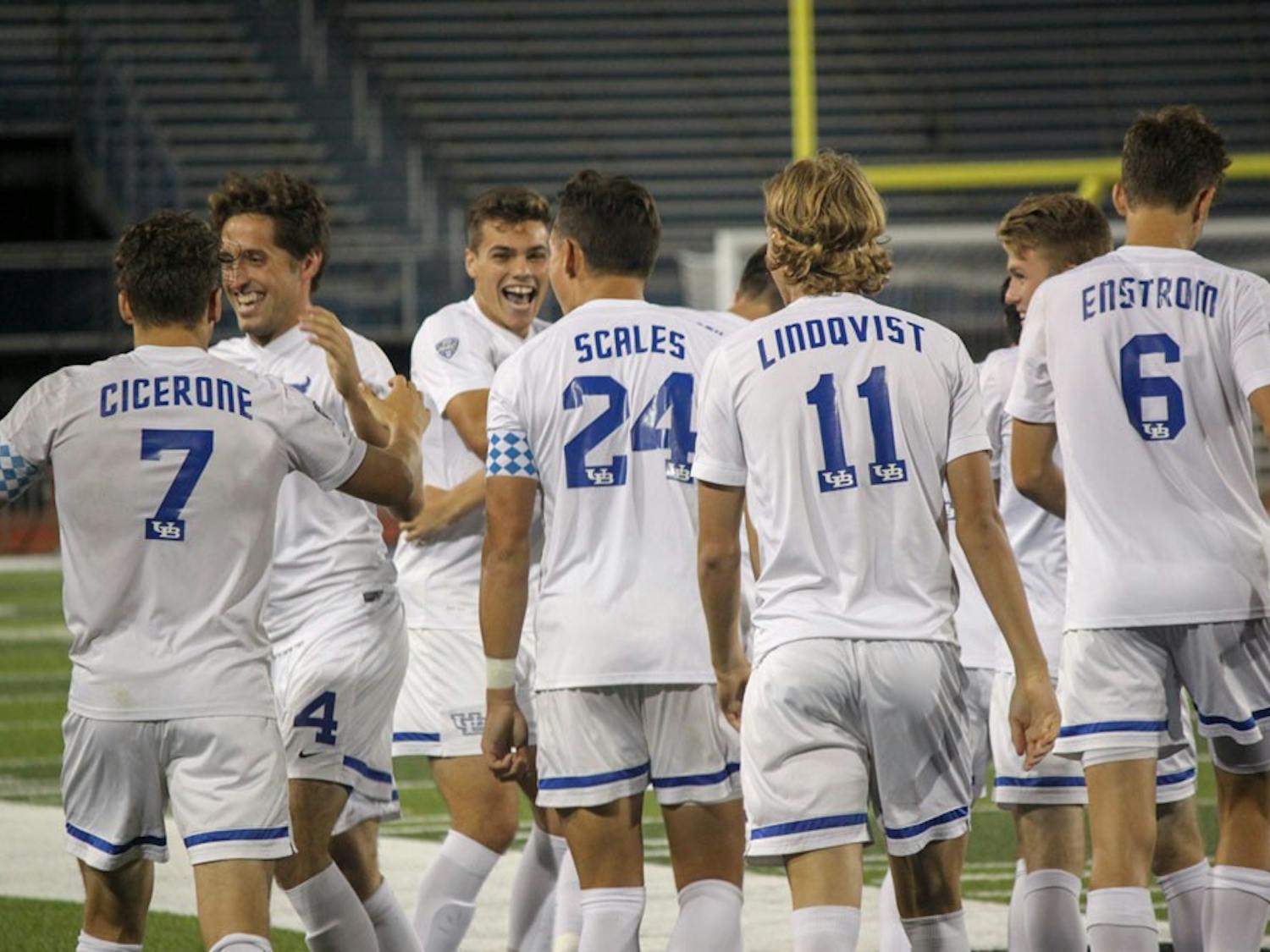UB men's soccer team celebrates after a win. The men's soccer team will be cut from UB Athletics starting fall 2017.&nbsp;