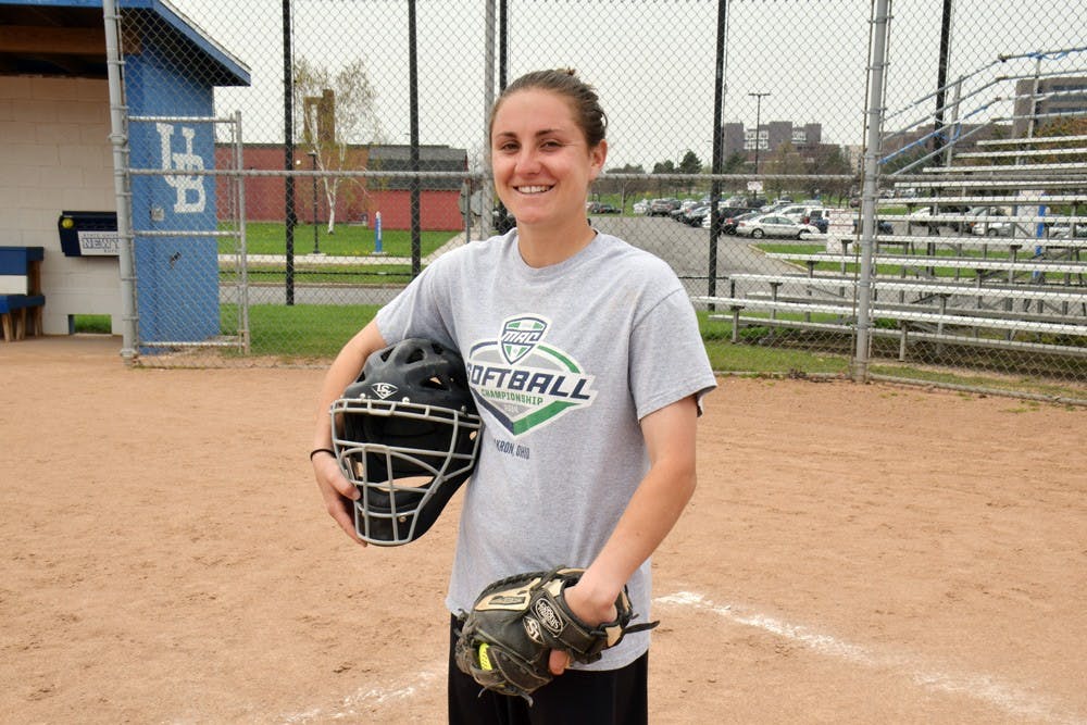 <p>Senior Curtiss takes a look at the softball field one last time. Curtiss will graduate as UB's all-time leader in hits. </p>