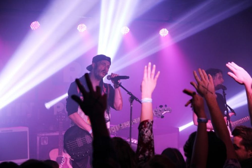 Jason Huber (left) and Jordan Kelley (right), the musical duo of Cherub, rocked the Waiting Room on Wednesday with their high-energy, electropop performance.&nbsp;Brian Windschitl, The Spectrum