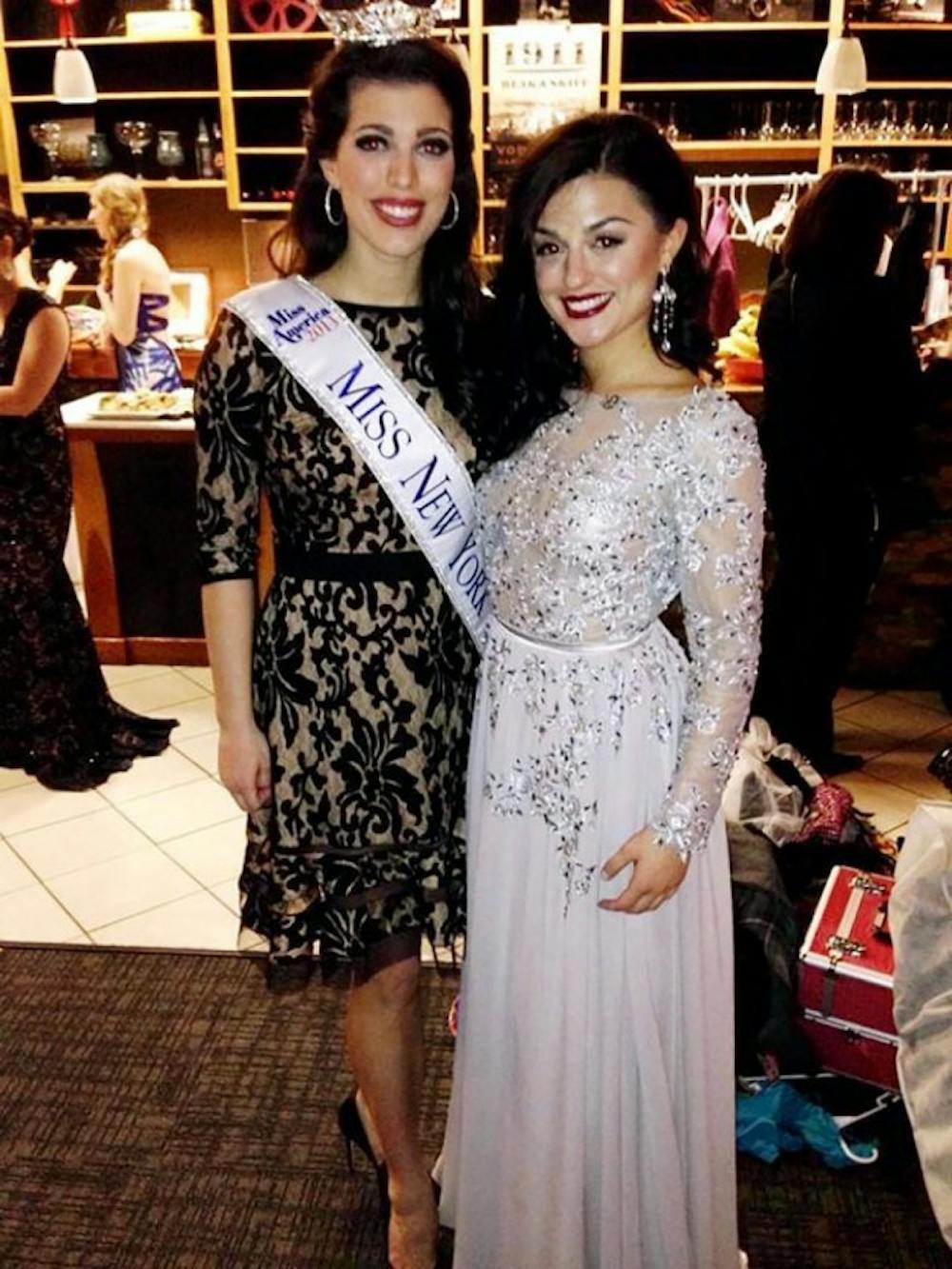 Anastasia Harisis, a junior biology major, with her mentor Miss New York 2013,
Amanda Mason. Harisis has been competing in beauty pageants since
high school and uses the pageants as an outlet to teach others about melanoma,
which she was diagnosed with at age 18. She is now cancer-free.
Courtesy of Anastasia Harisis 