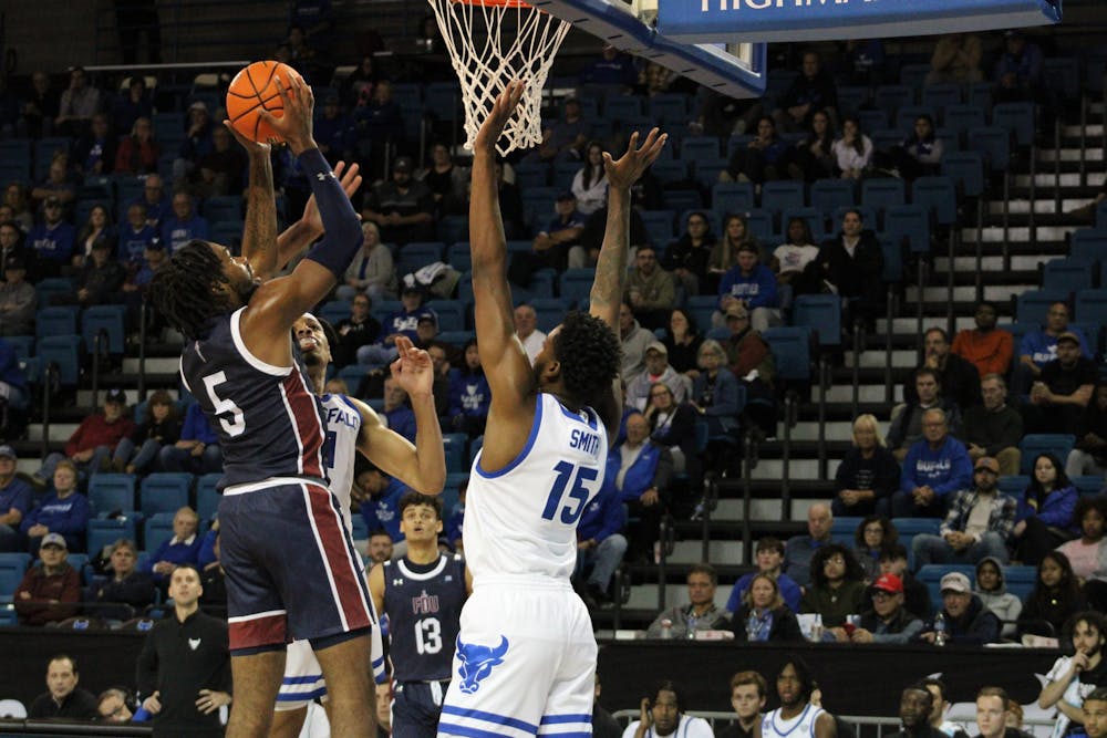 <p>Senior forward Jonnivius Smith, pictured at the men's opener in November, was able to get the Bulls on the board with a layup early on, but the Broncos held their lead.&nbsp;</p>