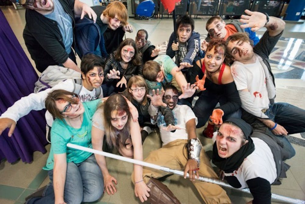 On Friday, SARPA held its fifth annual Zombie Walk to raise awareness for brain cancer research. Using fake blood and liquid latex, students transformed each other into zombies and then convened in the Union for the walk through the Union, academic spine and Ellicott Complex.&nbsp;
Wenyi Yang, The Spectrum
