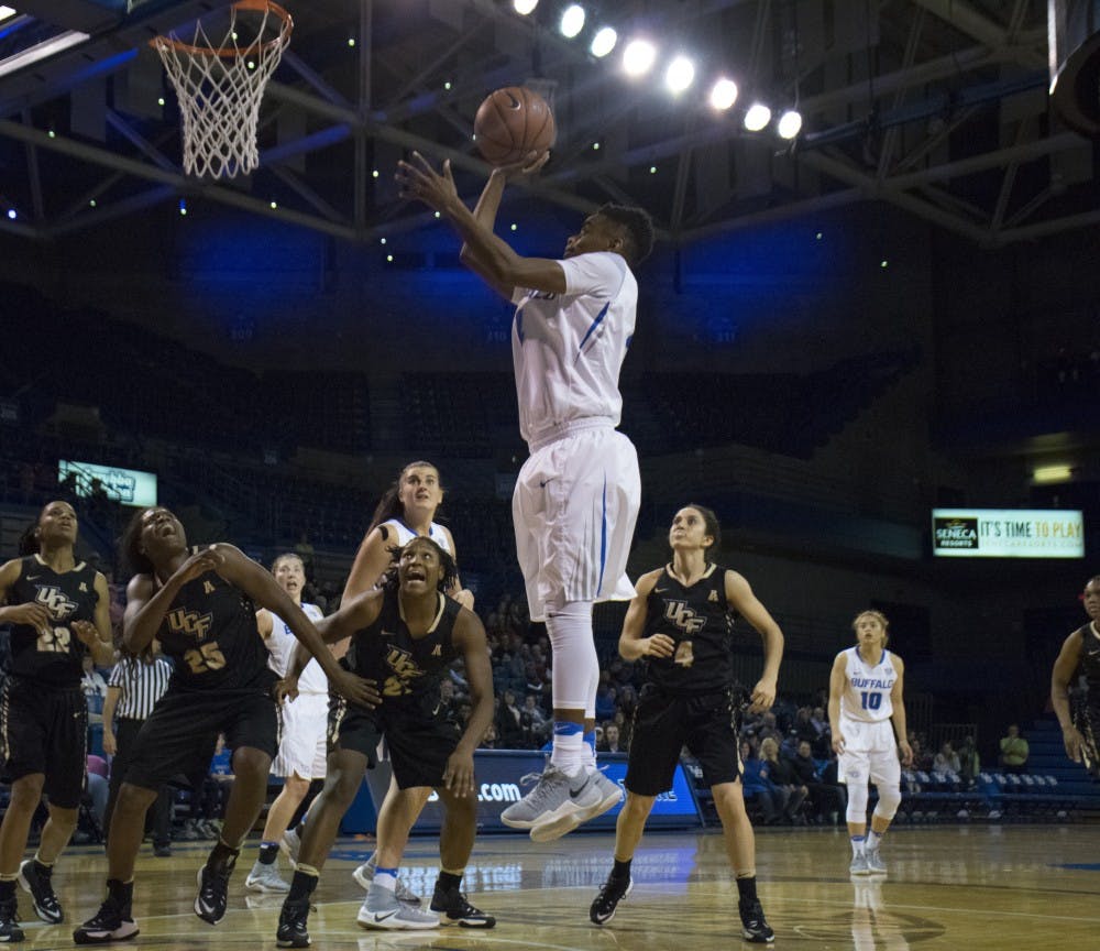 <p>Senior guard Joanna Smith goes up for a layup at a December game against UFC.&nbsp;Smith had 18 points in the half and made all four of her three point attempts against Northern Illinois on Saturday.&nbsp;</p>