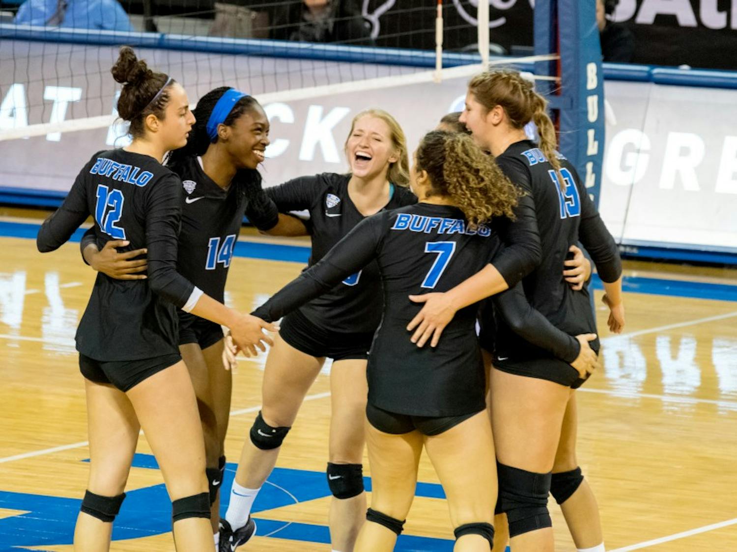 The Bulls huddle after the game. They will be playing in the MAC tournament starting on Nov. 16.