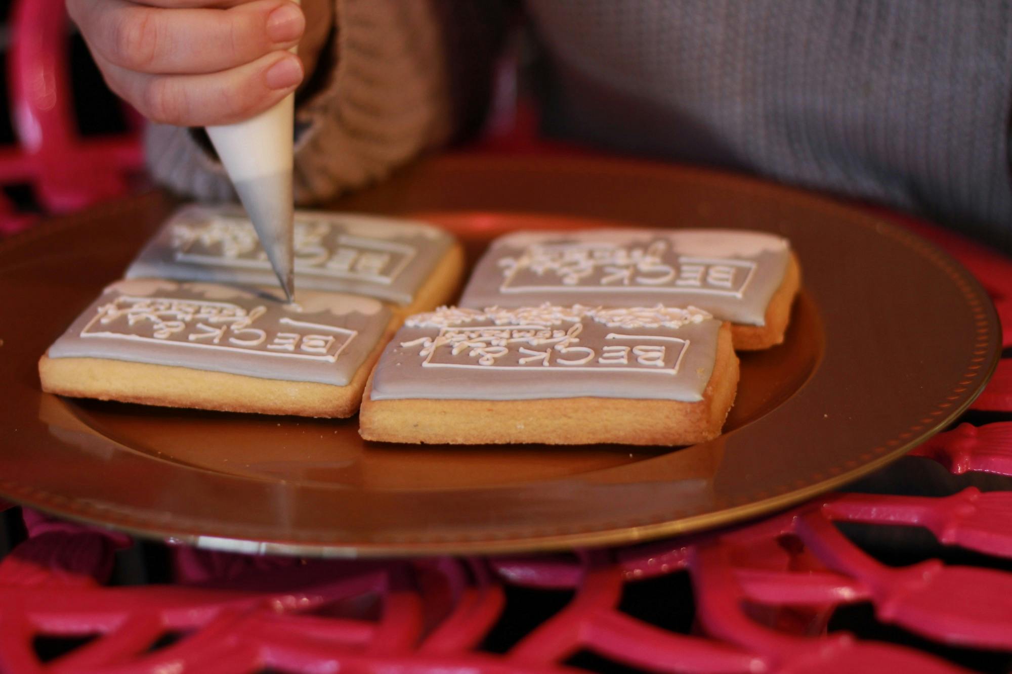 Bernardini decorates cookies.
