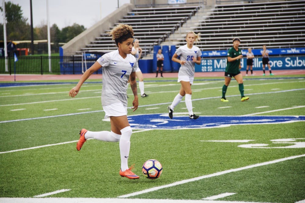 <p>Senior defender Rebecca Bramble dribbles down the sideline. Without senior forward Carissima Cutrona, the Bulls offense was lacking. The Bulls recorded nine shots with only three being on goal.</p>