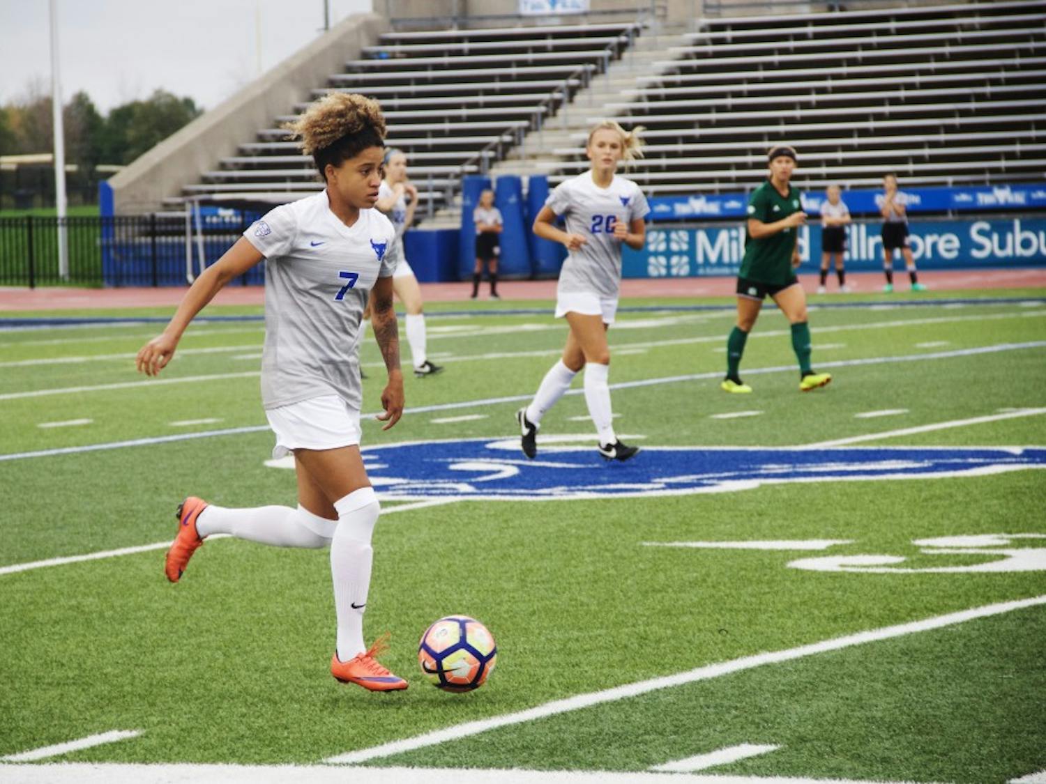 Senior defender Rebecca Bramble dribbles down the sideline. Without senior forward Carissima Cutrona, the Bulls offense was lacking. The Bulls recorded nine shots with only three being on goal.