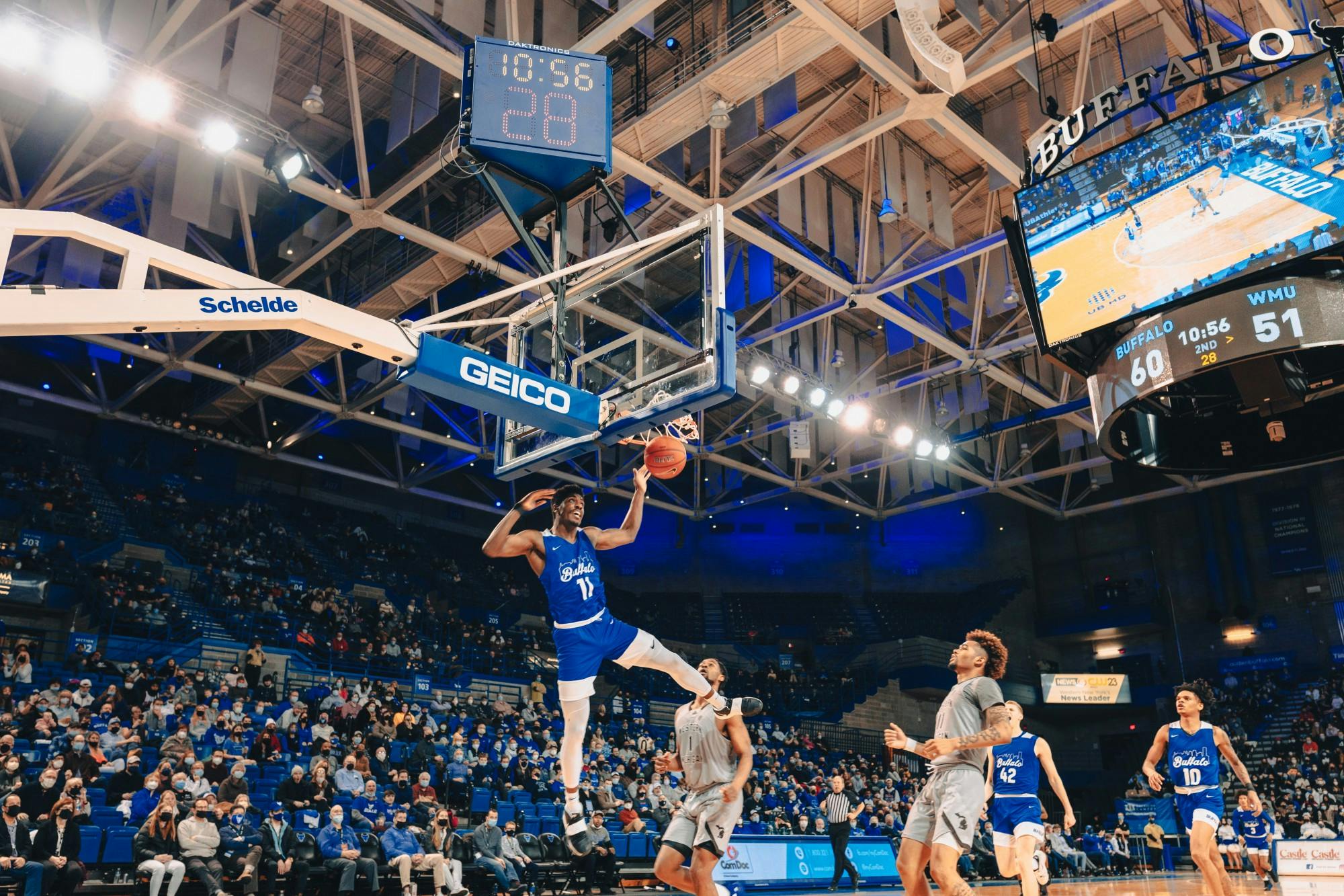 Senior forward Jeenathan Williams (11) dunks the ball in a recent game against Western Michigan at Alumni Arena.
