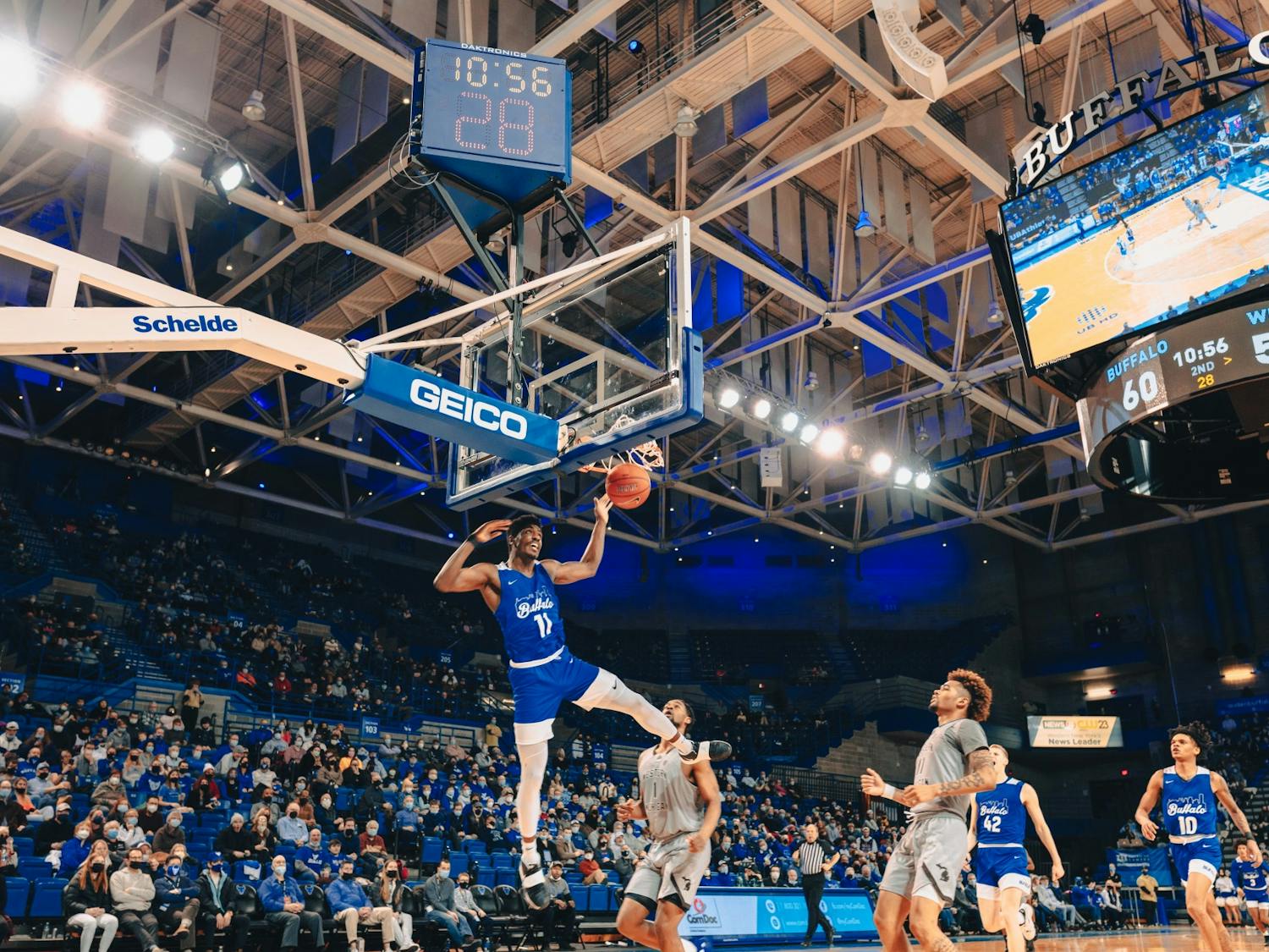 Senior forward Jeenathan Williams (11) dunks the ball in a recent game against Western Michigan at Alumni Arena.