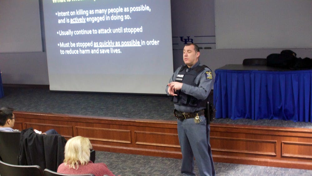 <p>Officer Scott Marciszewski is giving a presentation during the active-shooter training session. He went over the ‘Run, Hide, Fight’ method, the active shooter protocol based on the department of Homeland Security’s response model.</p>