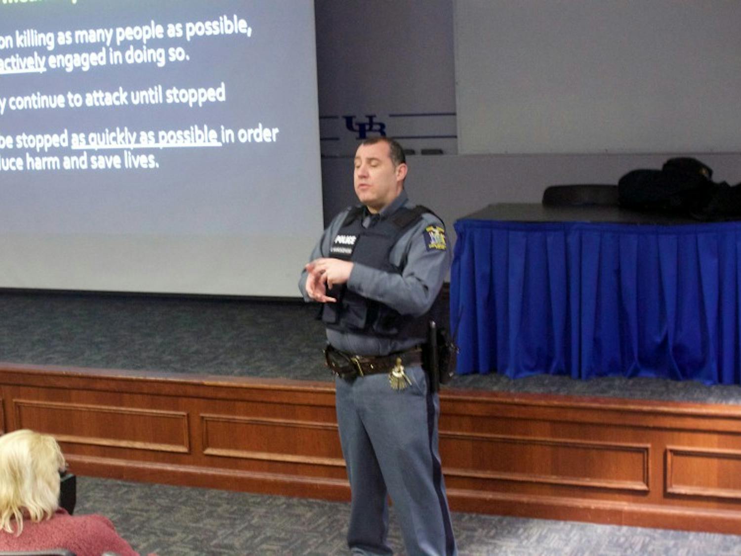 Officer Scott Marciszewski is giving a presentation during the active-shooter training session. He went over the ‘Run, Hide, Fight’ method, the active shooter protocol based on the department of Homeland Security’s response model.