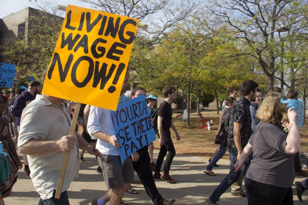 <p>TAs, graduate and doctoral students in the English department will receive a larger stipend beginning in the fall semester. After fighting for a "living wage," many students still think that these changes aren't satisfactory.</p>