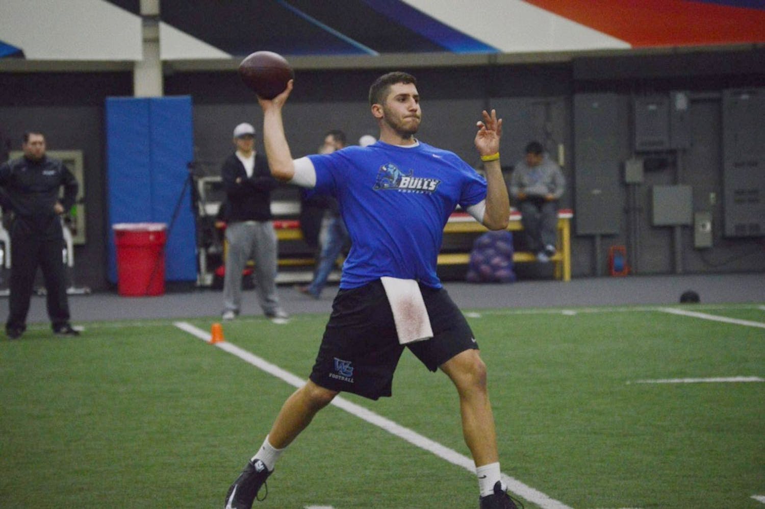 Joe Licata attempts a pass at UB's Pro Day this past month. Licata and 11 former teammates attempted to impress professional scouts and ranks No. 10 on our monthly top-10 list.&nbsp;