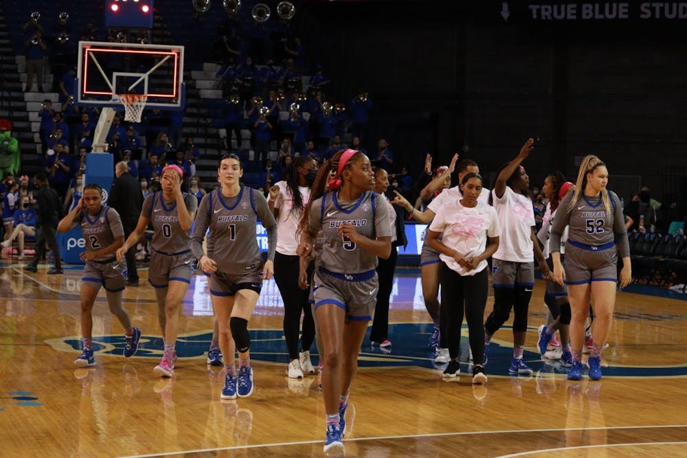 Junior guard Nia Jordan (5) and the rest of the UB women's basketball team runs off the court following a recent game.