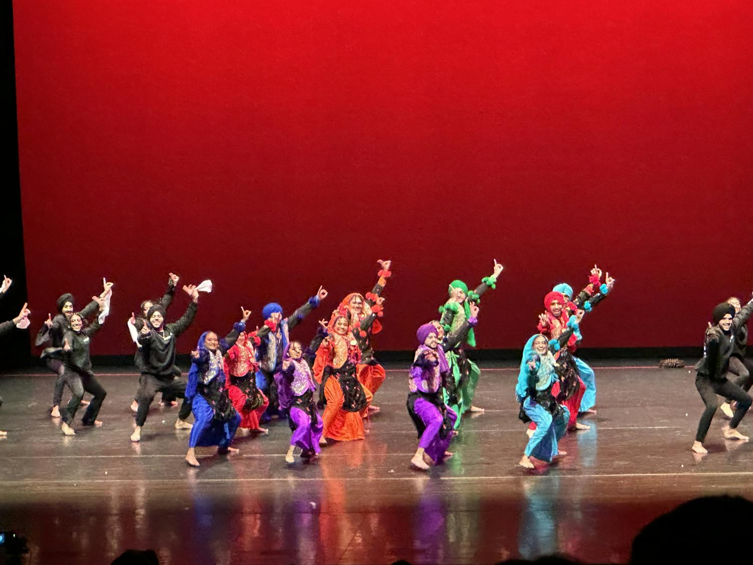 Performers wore bright, intricate outfits at this year's International Fiesta.
